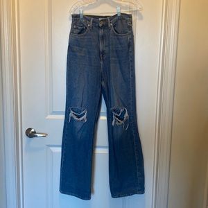 Levi's high rise loose wider/straight leg ripped knee 27.